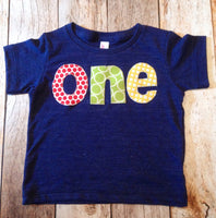 one for 1st Birthday Number pick ball dot circle primary red, yellow, grass green on triblend indigo primary colors navy boys